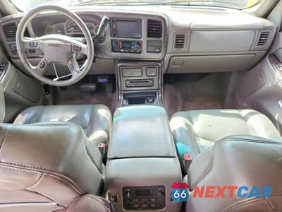 Zdjęcie 8 z 13 samochodu: 2006 GMC YUKON DENALI VIN:1GKEK63U86J105751 - miniatura