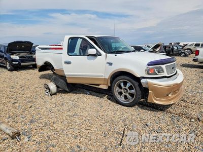 Czwarte zdjęcie samochodu z boku: 1999 FORD F150 VIN:1FTRX17W0XKA22548 - miniatura