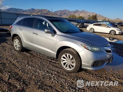 Czwarte zdjęcie samochodu z boku: 2017 ACURA RDX VIN:5J8TB4H32HL009419 - miniatura