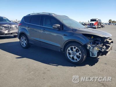 Czwarte zdjęcie samochodu z boku: 2016 FORD ESCAPE TITANIUM VIN:1FMCU0J95GUB08272 - miniatura
