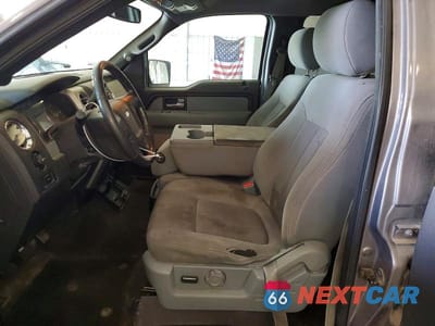 Zdjęcie 7 z 12 samochodu: 2014 FORD F150 SUPERCREW VIN:1FTFW1CFXEKG20316 - miniatura