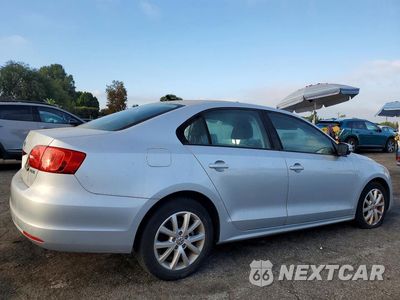 Trzecie zdjęcie samochodu z tyłu: 2012 VOLKSWAGEN JETTA SE VIN:3VWDP7AJ7CM401458 - miniatura