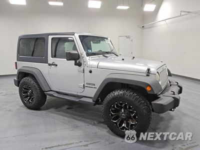 Czwarte zdjęcie samochodu z boku: 2011 JEEP WRANGLER SPORT VIN:1J4GA2D17BL636517 - miniatura