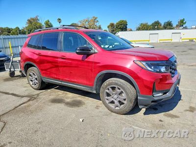 Czwarte zdjęcie samochodu z boku: 2024 HONDA PASSPORT TRAIL SPORT VIN:5FNYF8H68RB009584 - miniatura