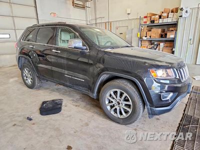 Czwarte zdjęcie samochodu z boku: 2014 JEEP GRAND CHEROKEE LIMITED VIN:1C4RJFBG0EC342085 - miniatura