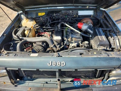 Zdjęcie 12 z 13 samochodu: 1994 JEEP CHEROKEE SPORT VIN:1J4FJ68SXRL148162 - miniatura