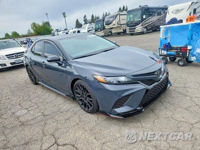 Czwarte zdjęcie samochodu z boku: 2024 TOYOTA CAMRY TRD VIN:4T1KZ1AK8RU090035 - miniatura