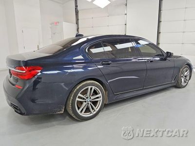 Trzecie zdjęcie samochodu z tyłu: 2019 BMW 750 XI VIN:WBA7F2C57KB240148 - miniatura