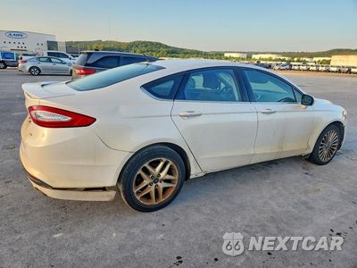 Trzecie zdjęcie samochodu z tyłu: 2016 FORD FUSION SE VIN:3FA6P0H76GR101650 - miniatura