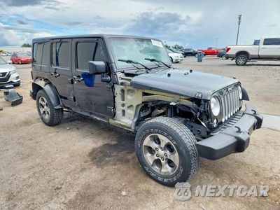 Czwarte zdjęcie samochodu z boku: 2017 JEEP WRANGLER UNLIMITED SAHARA VIN:1C4BJWEG6HL627536 - miniatura