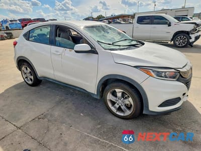 Czwarte zdjęcie samochodu z boku: 2022 HONDA HR-V LX VIN:3CZRU6H3XNM746743 - miniatura