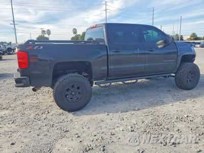 Trzecie zdjęcie samochodu z tyłu: 2018 CHEVROLET SILVERADO K1500 LT VIN:3GCUKREC4JG479149 - miniatura