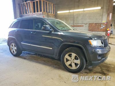 Czwarte zdjęcie samochodu z boku: 2013 JEEP GRAND CHEROKEE LAREDO VIN:1C4RJFAG3DC502346 - miniatura