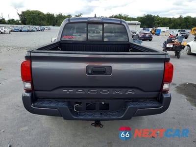 Zdjęcie 6 z 12 samochodu: 2021 TOYOTA TACOMA SR VIN:5TFAX5GNXMX194550 - miniatura