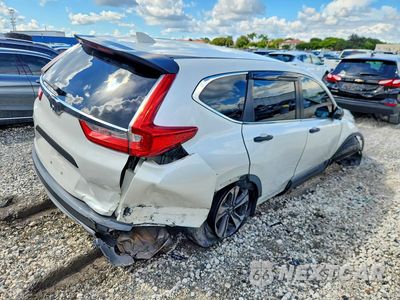 Trzecie zdjęcie samochodu z tyłu: 2018 HONDA CR-V LX VIN:2HKRW5H39JH402427 - miniatura