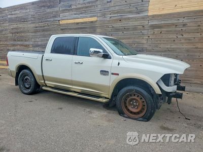 Czwarte zdjęcie samochodu z boku: 2016 RAM 1500 LONGHORN VIN:1C6RR7PM7GS231224 - miniatura