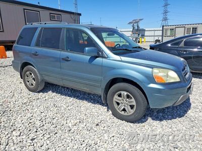 Czwarte zdjęcie samochodu z boku: 2005 HONDA PILOT EXL VIN:2HKYF18535H559902 - miniatura