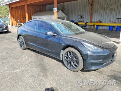 Czwarte zdjęcie samochodu z boku: 2021 TESLA MODEL 3 VIN:5YJ3E1EAXMF908355 - miniatura