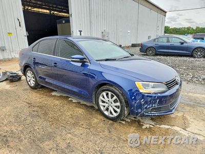 Czwarte zdjęcie samochodu z boku: 2014 VOLKSWAGEN JETTA SE VIN:3VWD17AJ6EM304739 - miniatura