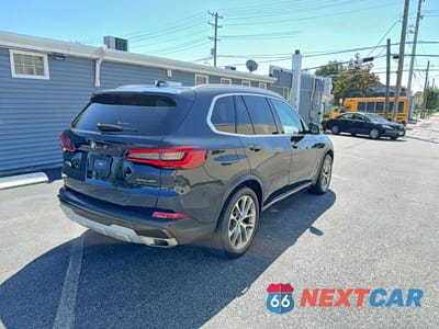 Czwarte zdjęcie samochodu z boku: 2023 BMW X5 XDRIVE40I VIN:5UXCR6C01P9P58063 - miniatura