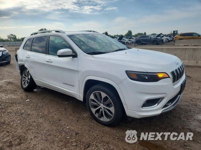 Czwarte zdjęcie samochodu z boku: 2019 JEEP CHEROKEE OVERLAND VIN:1C4PJMJX3KD261116 - miniatura