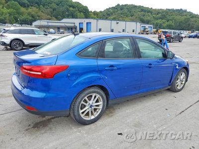 Trzecie zdjęcie samochodu z tyłu: 2018 FORD FOCUS SE VIN:1FADP3FE0JL215675 - miniatura