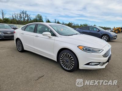 Czwarte zdjęcie samochodu z boku: 2017 FORD FUSION TITANIUM VIN:3FA6P0K97HR211490 - miniatura