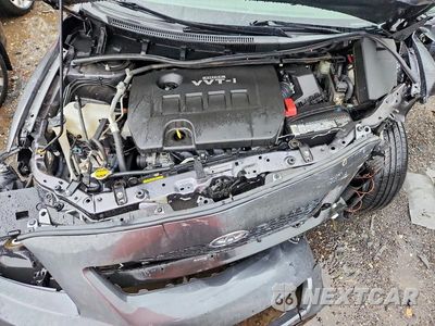 Zdjęcie 11 z 12 samochodu: 2009 TOYOTA COROLLA LE VIN:JTDBL40E499073836 - miniatura