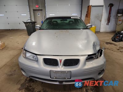 Piąte zdjęcie samochodu w środku: 2000 PONTIAC GRAND PRIX GT VIN:1G2WP12K3YF249772 - miniatura