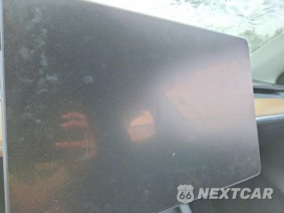 Zdjęcie 9 z 12 samochodu: 2023 TESLA MODEL Y VIN:7SAYGDEE5PA032772 - miniatura