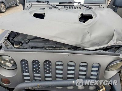 Zdjęcie 12 z 13 samochodu: 2011 JEEP WRANGLER SPORT VIN:1J4AA2D19BL550938 - miniatura