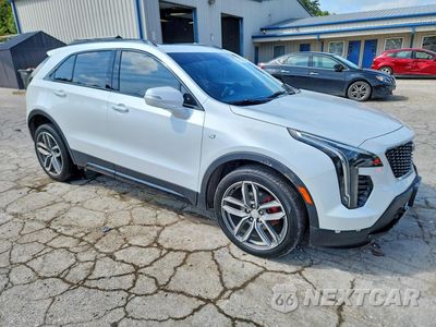 Czwarte zdjęcie samochodu z boku: 2021 CADILLAC XT4 SPORT VIN:1GYFZFR46MF048592 - miniatura