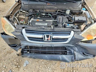 Zdjęcie 12 z 13 samochodu: 2004 HONDA CR-V LX VIN:SHSRD68404U208725 - miniatura