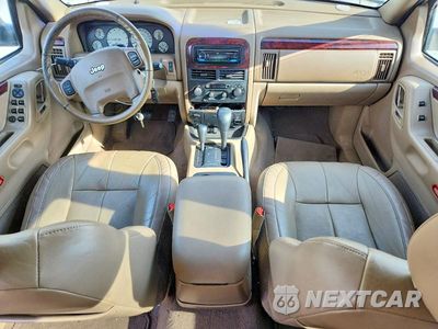 Zdjęcie 8 z 13 samochodu: 2002 JEEP GRAND CHEROKEE LIMITED VIN:1J8GW58J22C272597 - miniatura
