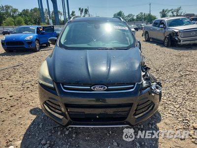 Piąte zdjęcie samochodu w środku: 2014 FORD ESCAPE TITANIUM VIN:1FMCU0JX8EUE38290 - miniatura