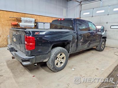 Trzecie zdjęcie samochodu z tyłu: 2016 CHEVROLET SILVERADO K1500 LT VIN:3GCUKREC6GG145794 - miniatura