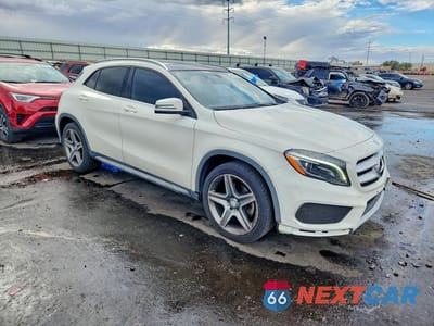 Czwarte zdjęcie samochodu z boku: 2015 MERCEDES-BENZ GLA 250 4MATIC VIN:WDCTG4GB9FJ058371 - miniatura