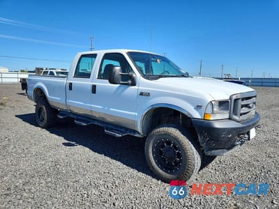 Czwarte zdjęcie samochodu z boku: 2002 FORD F350 SRW SUPER DUTY VIN:1FTSW31L62EB00367 - miniatura