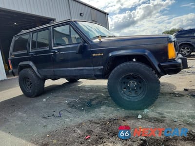 Czwarte zdjęcie samochodu z boku: 1991 JEEP CHEROKEE LIMITED VIN:1J4FJ78S4ML574251 - miniatura