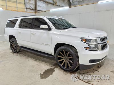 Czwarte zdjęcie samochodu z boku: 2019 CHEVROLET SUBURBAN C1500 LT VIN:1GNSCHKC2KR329973 - miniatura