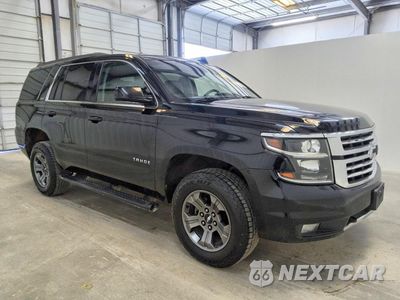 Czwarte zdjęcie samochodu z boku: 2018 CHEVROLET TAHOE K1500 LT VIN:1GNSKBKC7JR223596 - miniatura