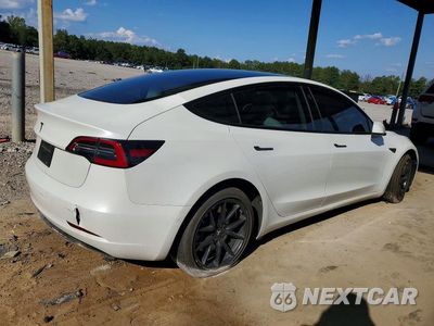 Trzecie zdjęcie samochodu z tyłu: 2021 TESLA MODEL 3 VIN:5YJ3E1EB4MF903306 - miniatura