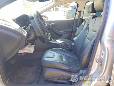 Zdjęcie 7 z 12 samochodu: 2016 FORD FOCUS TITANIUM VIN:1FADP3J22GL203520 - miniatura
