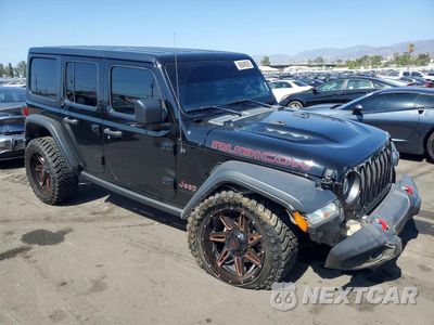 Czwarte zdjęcie samochodu z boku: 2022 JEEP WRANGLER UNLIMITED RUBICON VIN:1C4HJXFN7NW242073 - miniatura