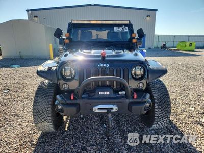 Piąte zdjęcie samochodu w środku: 2014 JEEP WRANGLER UNLIMITED RUBICON VIN:1C4HJWFG2EL282073 - miniatura