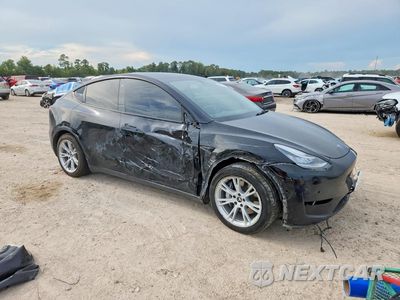 Czwarte zdjęcie samochodu z boku: 2021 TESLA MODEL Y VIN:5YJYGAEE3MF235962 - miniatura