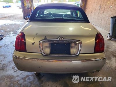 Zdjęcie 6 z 12 samochodu: 1999 LINCOLN TOWN CAR SIGNATURE VIN:1LNHM82W8XY635126 - miniatura