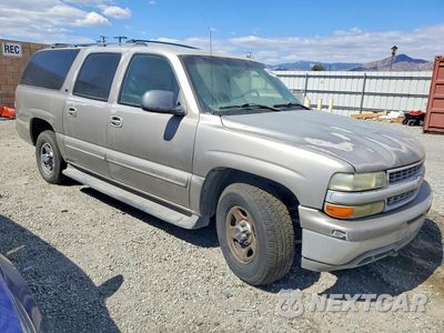 Czwarte zdjęcie samochodu z boku: 2002 CHEVROLET SUBURBAN C1500 VIN:1GNEC16T42J216099 - miniatura