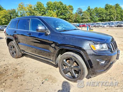 Czwarte zdjęcie samochodu z boku: 2014 JEEP GRAND CHEROKEE LAREDO VIN:1C4RJFAG2EC534108 - miniatura