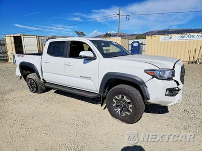 Czwarte zdjęcie samochodu z boku: 2023 TOYOTA TACOMA TRD OFF-ROAD VIN:3TMCZ5AN1PM552883 - miniatura